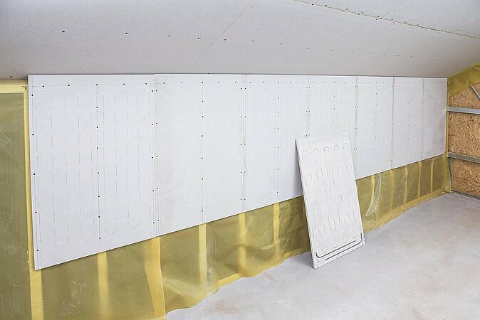 KAN-therm Wall: aktivierte Gipsfaserplatten zur raumweisen energetischen Sanierung im Gebäudebestand