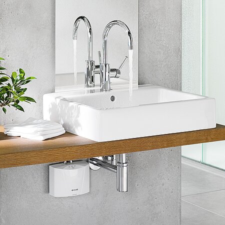 Kleiner Helfer am Waschbecken: Durchlauferhitzer im Gäste-WC hilft, Energie und Wasser zu sparen