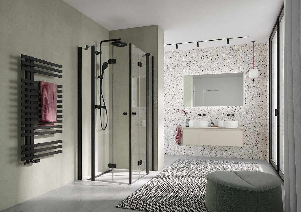 Markanter Materialkontrast: RenoDeco Betonoptik, Oliv mit Struktur-Oberfläche trifft auf Terrazzo Stracciatella und schafft eine moderne, lebendige Flächengestaltung. Bildnachweis: HSK Duschkabinenbau KG