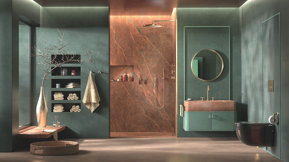 Modern und voller Charakter: Das Zusammenspiel aus Farbe und Texturen prägt diese Badarchitektur. Zu sehen ist Vaia in Dark Brass gebürstet, dazu die passende Duschkombination samt Accessoires wie Seifenspender und Handtuchhalter. Produktdesign: Sieger Design Copyright: Dornbracht